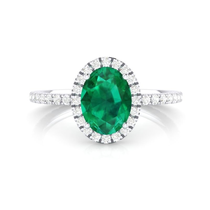 anillos de compromiso esmeralda y halo de diamantes